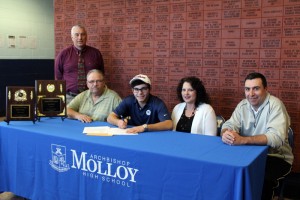 Michael Tammaro '15 signs with St. Francis College.