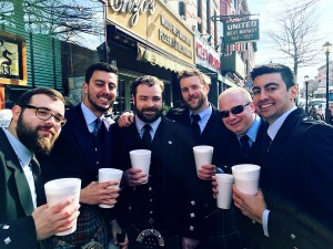 Alumni Band gathering before a parade.